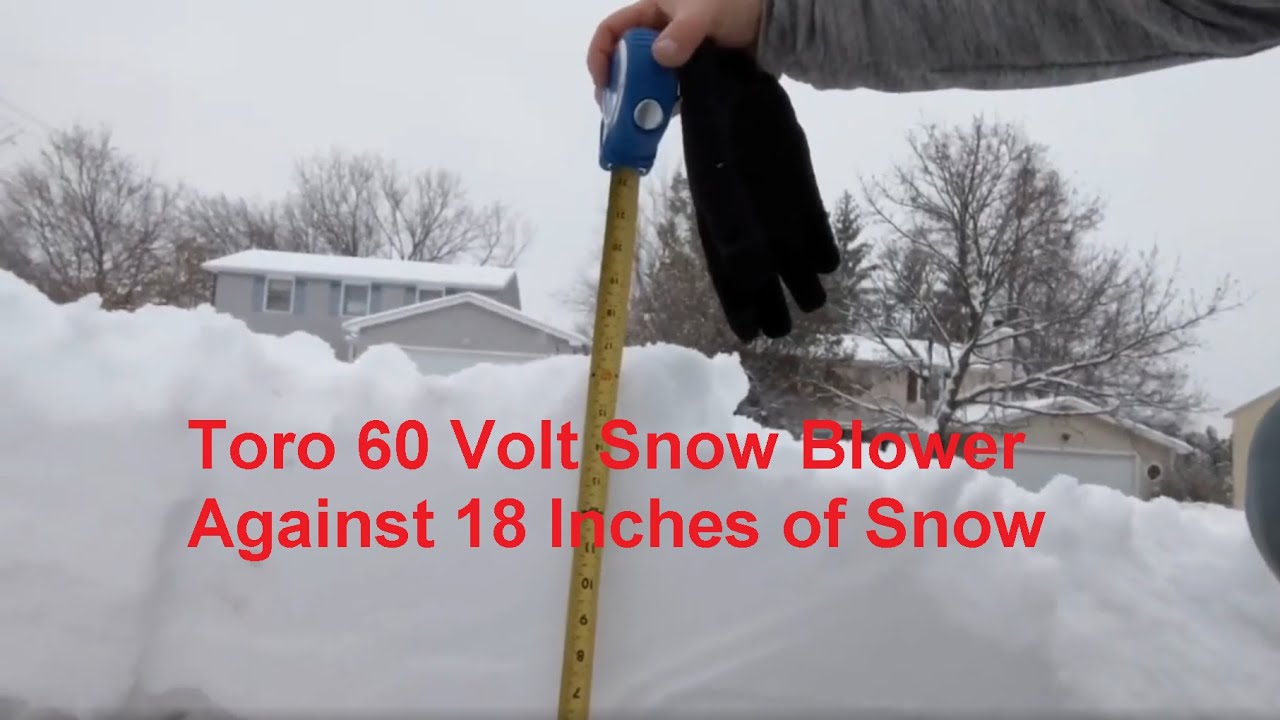 Toro Battery Snow Blower Against 18 inches of snow..