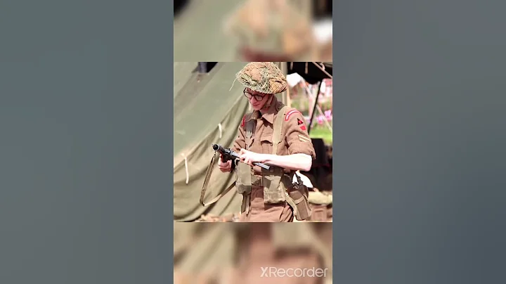 Re-enacter firing a Mk II Sten Gun