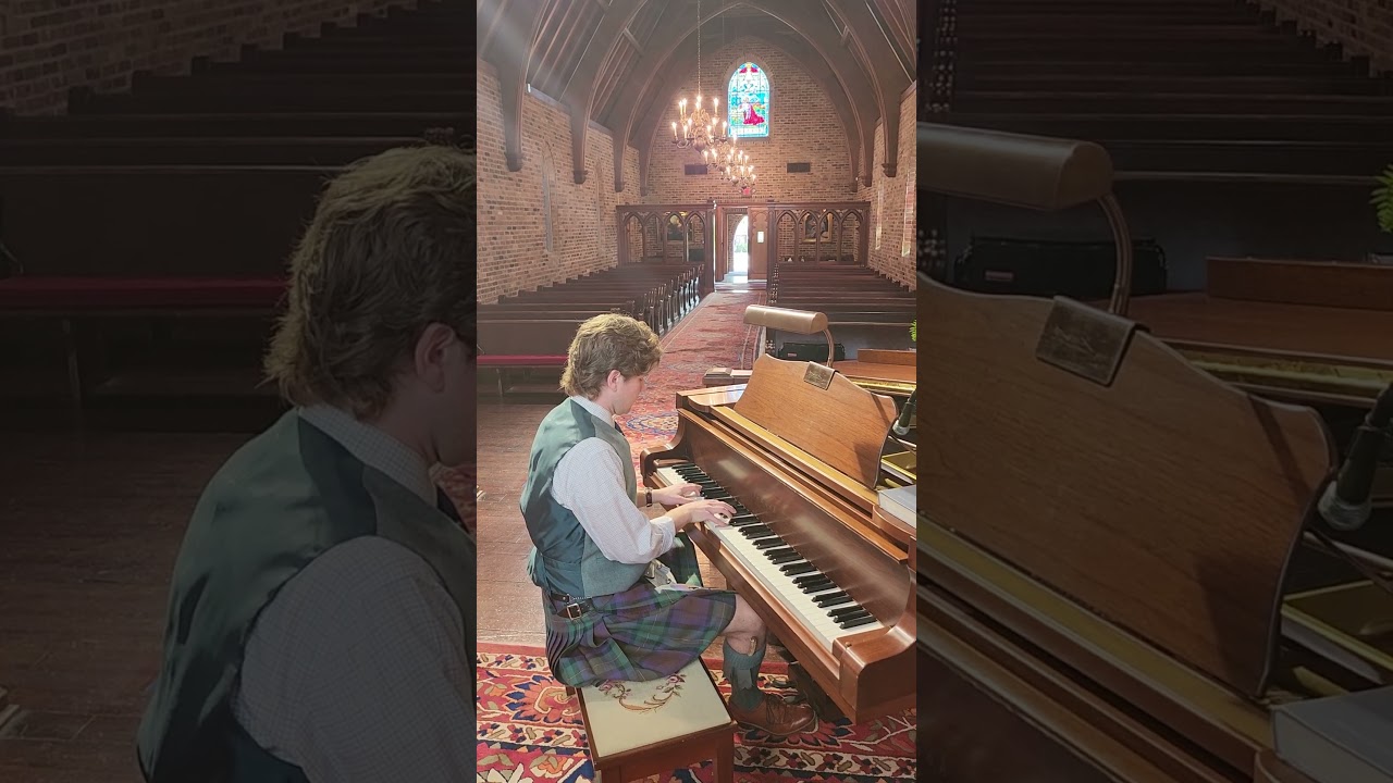 Playing piano (and wearing a kilt!) 
