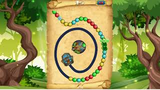 Zuma is a puzzle game where you shoot colored balls from a frog to match three .