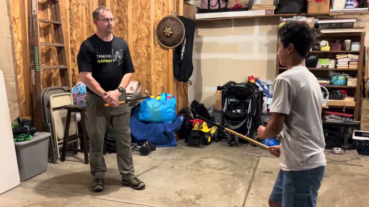 Seth learning his Garimot largo mano measurement against Parker’s height and length.