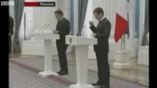 Russian President Dmitry Medvedev caught playing with iPhone