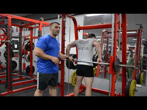 سحب حديد خلفي عريض سمث Smith Machine Shrug From The Back
