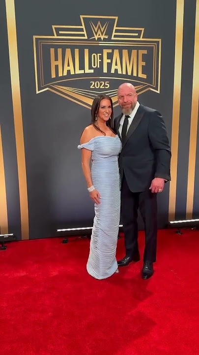 Stephanie McMahon and Triple H pose on the #WWEHOF Red Carpet 🤩🔥