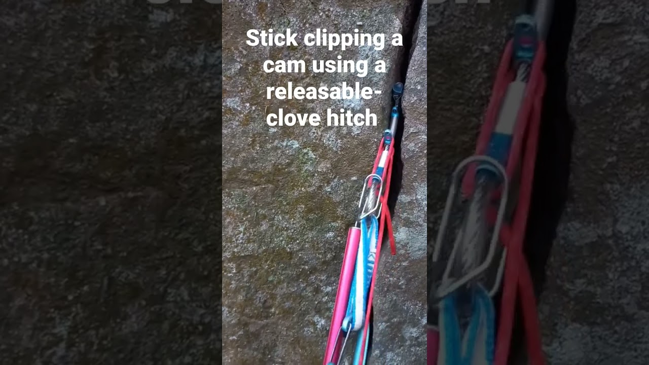 Stick clipping a cam on a trad route using a releasable-clove hitch 