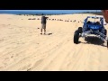 Truck launches off sand dune like a boss