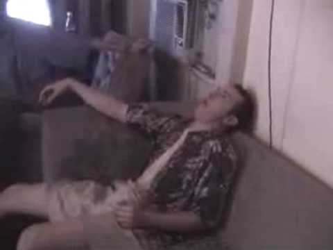 Drunk guy pukes on couch