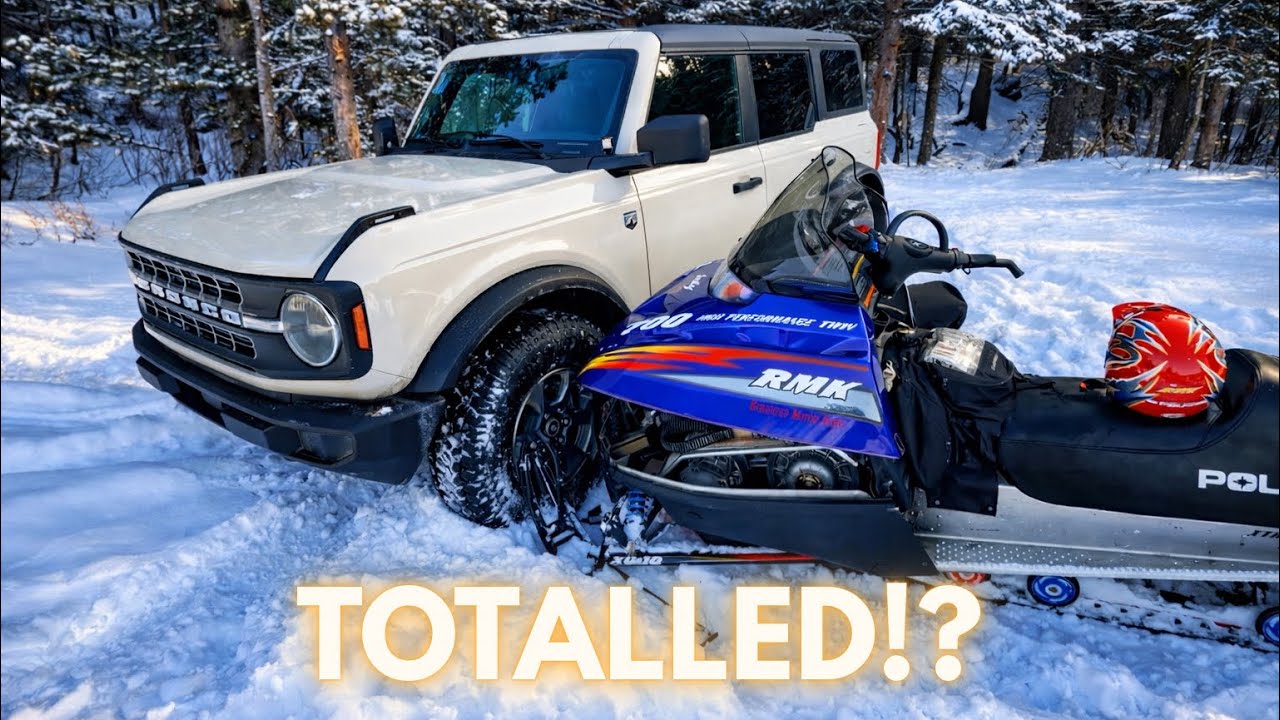 SNOWMOBILE CRASHES INTO FORD BRONCO!