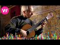 Gambar cover John Williams: Bach - Prelude from Lute Suite No. 4 in E Major Seville, Spain Part 2/9