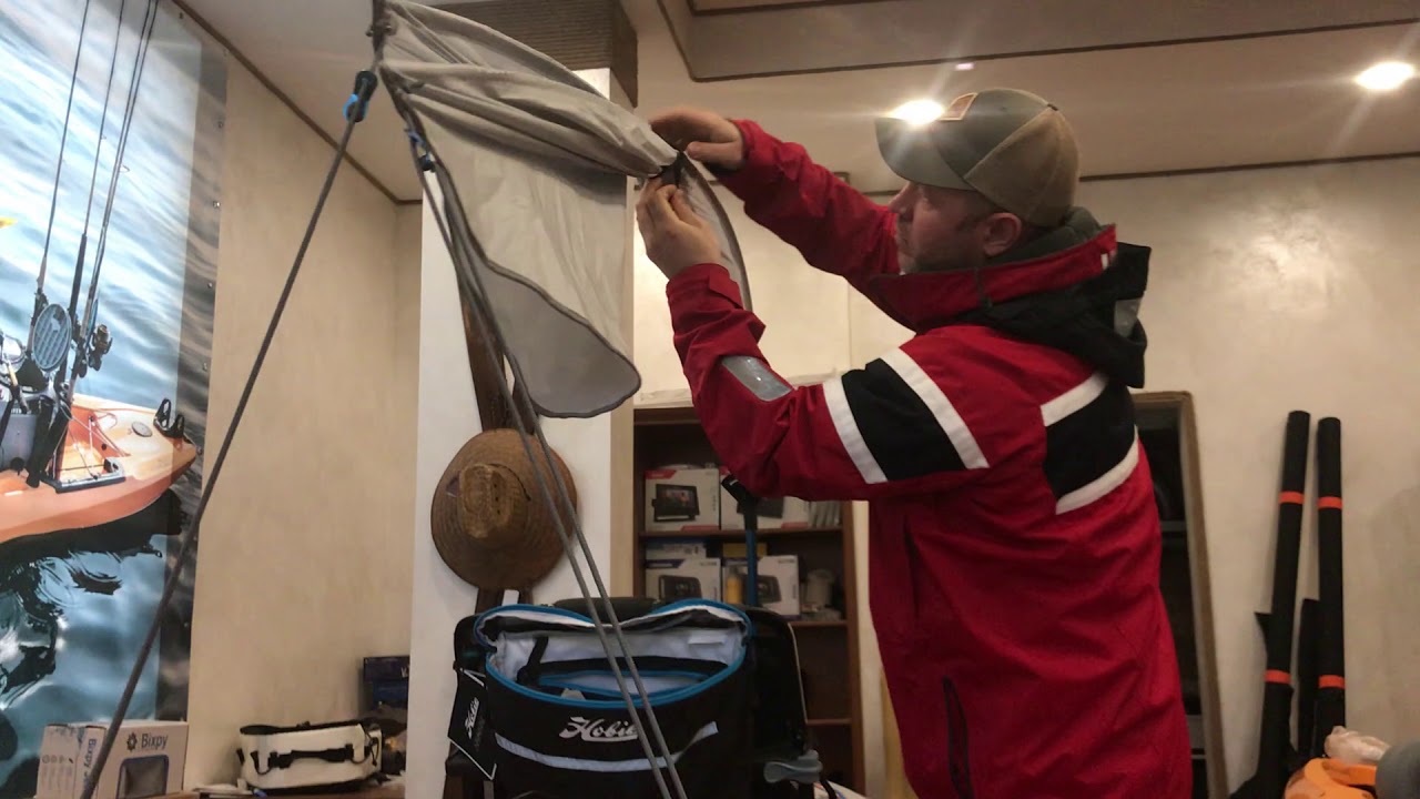 Quick folding of Hobie Bimini.