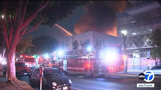 Firefighters battling large fire at commercial building in downtown Los Angeles
