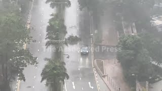 Strong winds and rain in Hong Kong as Tropical Storm Tapah passes nearby