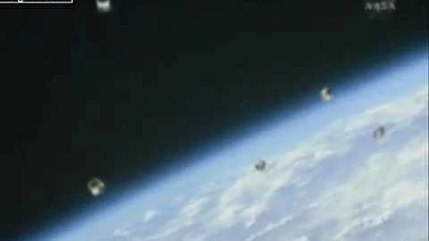 Space Shuttle Endeavour releasing a satellite