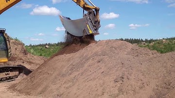 Processing TopSoil with Screening Bucket
