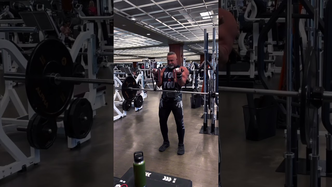 If you’re trying to increase the intensity of your barbell curls, try attaching two cable handles
