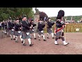 Strathisla Pipe band march in playing Bonnie Dundee during the 2023 Gordon Castle Highland Games