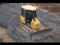 Komatsu D37EX-22 spreading gravel part 3 (a view from above)