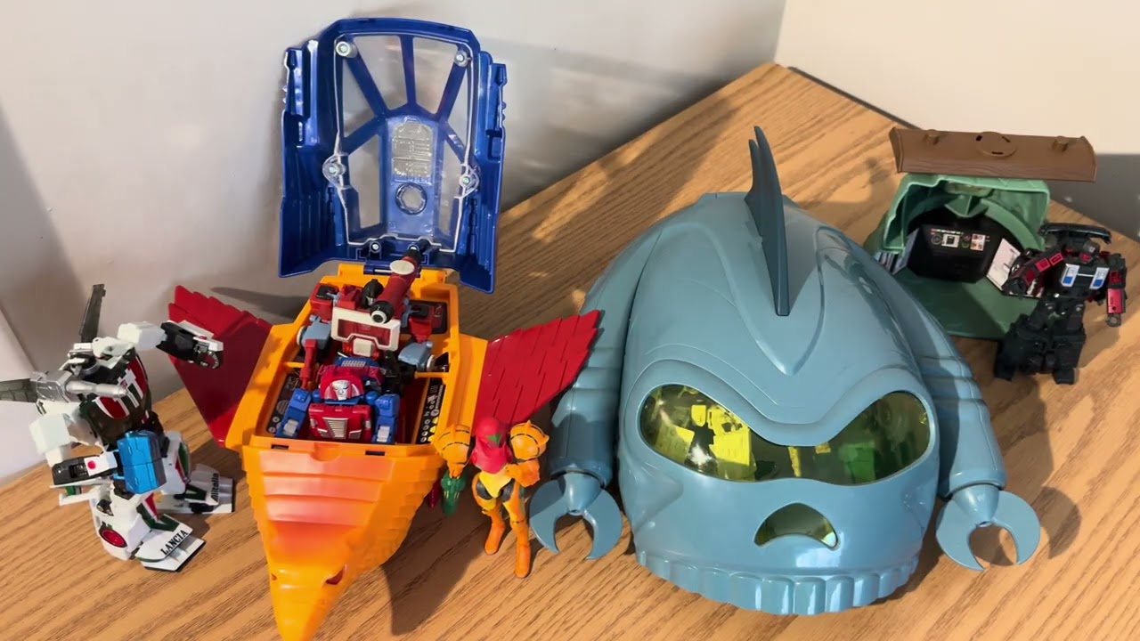 Transformers scale with MOTU vehicles