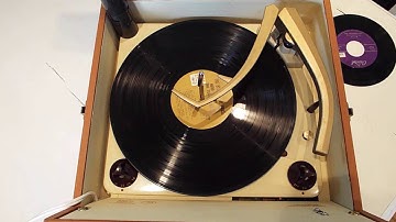 Zenith record player playing a 33 RPM record.
