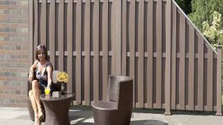 building a privacy fence of reclaimed materials