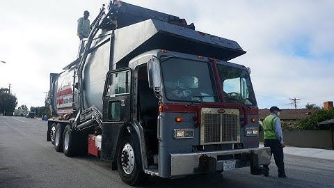 Athens Services - Amrep & McNeilus Front Loaders with Curotto Cans
