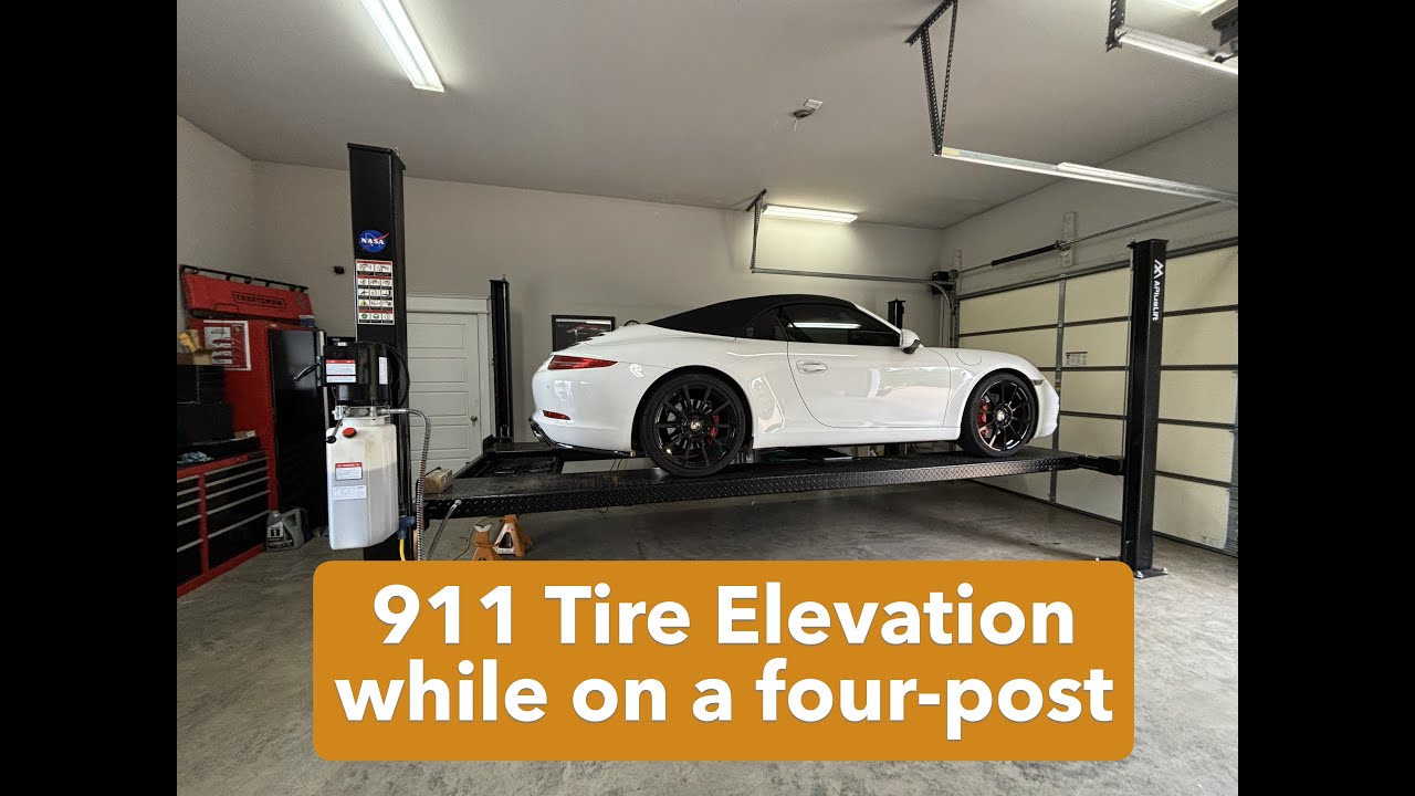 Как поднять шины 911 на четырехстоечном подъемнике.