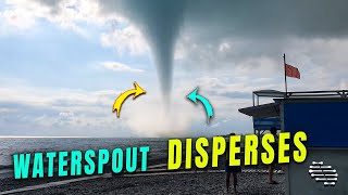 Waterspout Approaches a Beach the Disperses