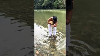 Wild Otter Nips Woman in River