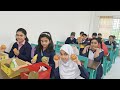 Students demonstrating parts of plants