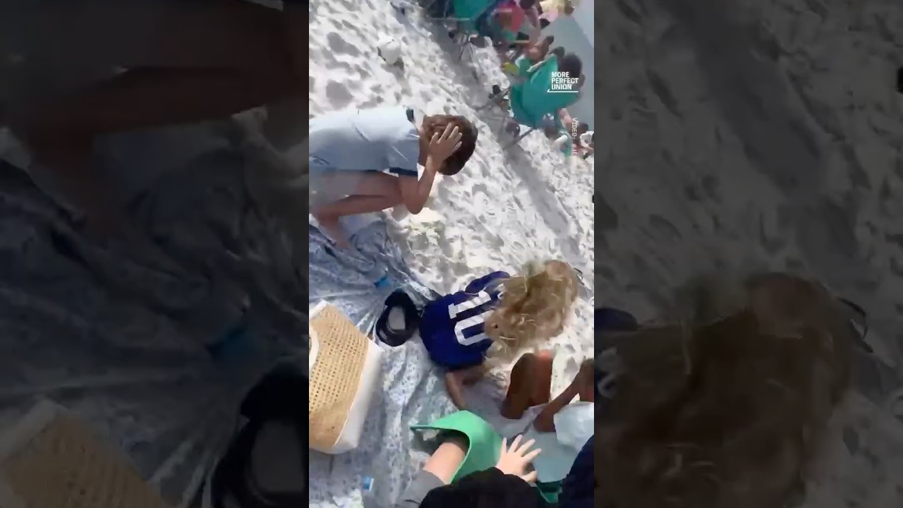 Military jet flies terrifyingly close to kids on beach