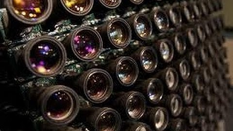 High Performance Imaging Using Large Arrays of Cameras