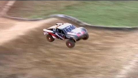 Traxxas Slash 4x4 - box stock on the track, driving while filming