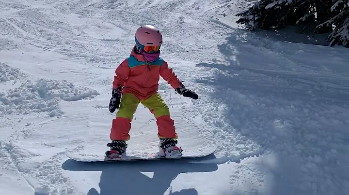 Mahtay snowboarding on the in pow on Mt. Crested B...