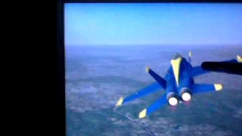 Playing FSX with my homemade touch screen monitor using SRF005 and picaxe