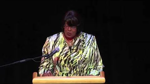 Dolores Mitchell reading "Momma Why?"