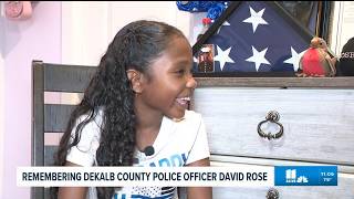 Young daughter of officer killed one year ago in CDC shooting shares memories of her dad