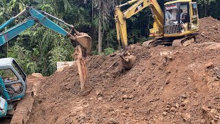 Two excavator machines remove soil construction site