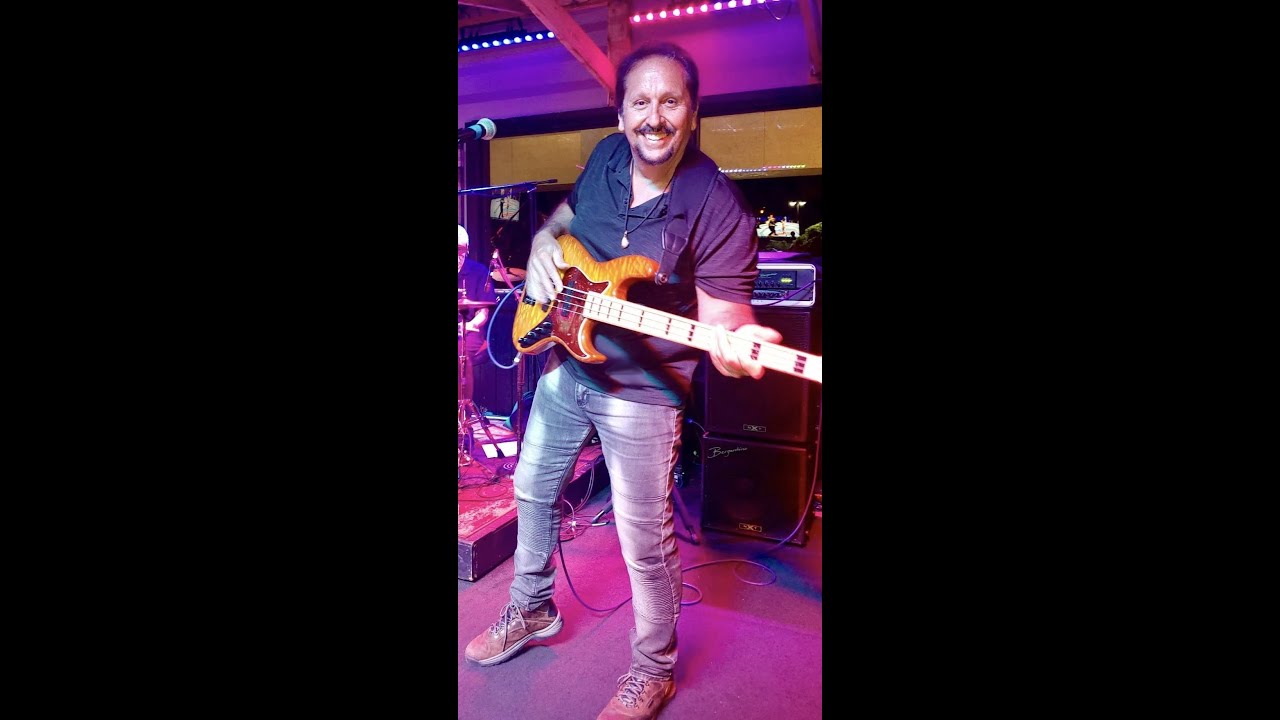 Paul Lee bass player with On The Roxx Band