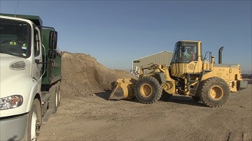 Loading a Dump Truck From a Stock Pile