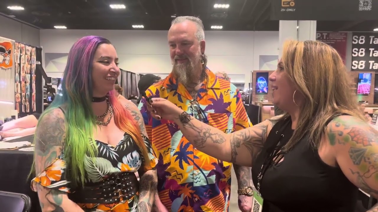 Troy Timpel and wife Shannon at the Villain Arts Tampa show holding his InkVasion Magazine’s cover!