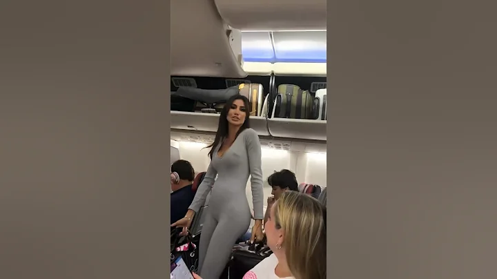 Woman on American Airlines upset with plane passenger in Miami Florida