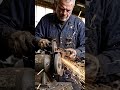 Mechanic using grinding and polishing tools to remove