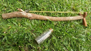 A powerful and accurate slingshot, using only a tree branch. DIY SLINGSHOT