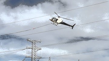 Close up of Helicopter Stringing High Voltage Conductor