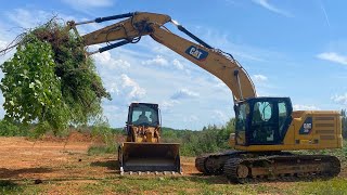 Land clearing with a CAT 320 excavator and a CAT 953 track loader!!