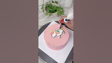 Thumbnail of Decorating a unicorn themed birthday cake using buttercream