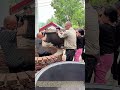 Lifting Together: Community Teamwork for Rural Stove Installation
