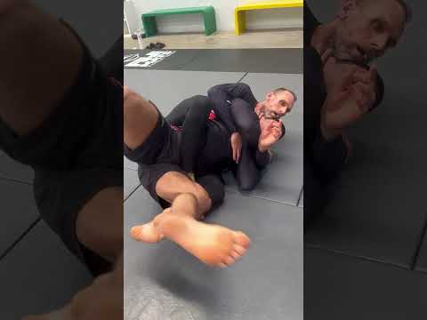Learn how to escape the body triangle with a World Champion.