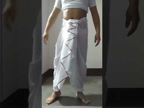 Video: Wat betekent het woord dhoti?