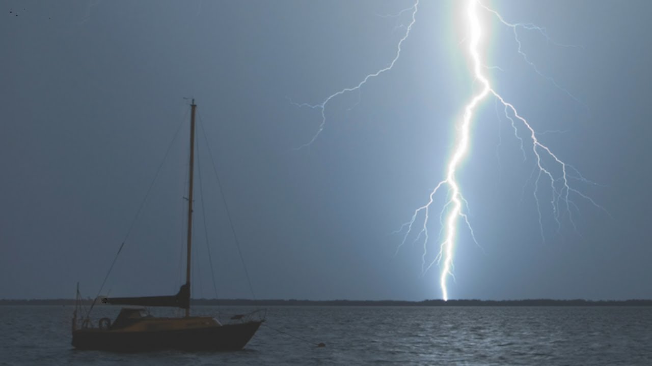 lightning strikes a sailboat